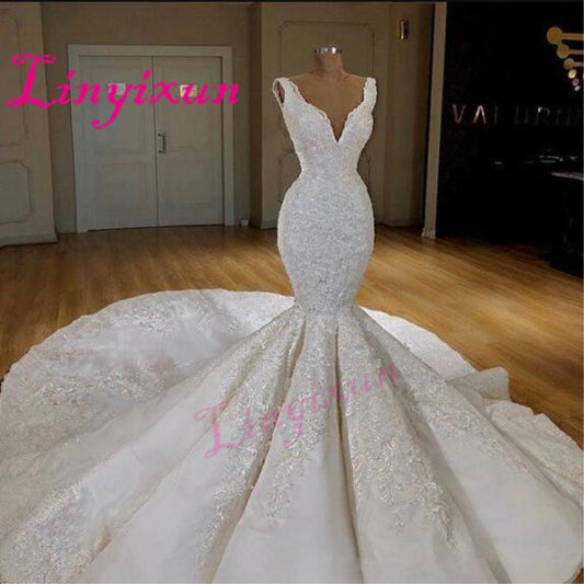 Dubai Sexy Corset Mermaid Wedding Dresses Deep V-Neck Sleeveless Lace Appliques Wedding Gowns 2021 Sweep Train Bridal Dress